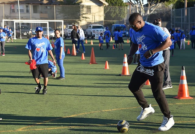 Reds OF Yasiel Puig surprises local kids playing baseball in Madisonville