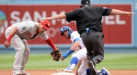 Los Angeles Dodgers infielder Chris Taylor steals second base against the Philadelphia Phillies