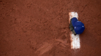 View of a Los Angeles Dodgers cap on the mound in the bullpen at Dodger Stadium