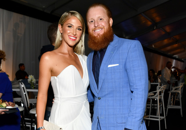 Justin Turner and wife Kourtney Turner after she sang the National News  Photo - Getty Images