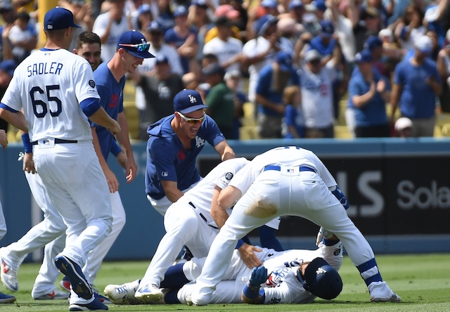 Los Angeles, USA. August 7, 2019: Los Angeles Dodgers catcher Russell Martin  (55) celebrates after hitting single to score 2 runs in the bottom of the  ninth between the St. Louis Cardinals