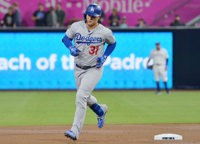 Miguel Rojas, Julio Urias help Dodgers finish 4-game sweep of