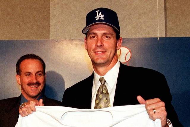 Kevin Brown after signing with the Los Angeles Dodgers to become the first $100 million player