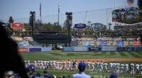 Dodgers lined up, national anthem, World Series banner