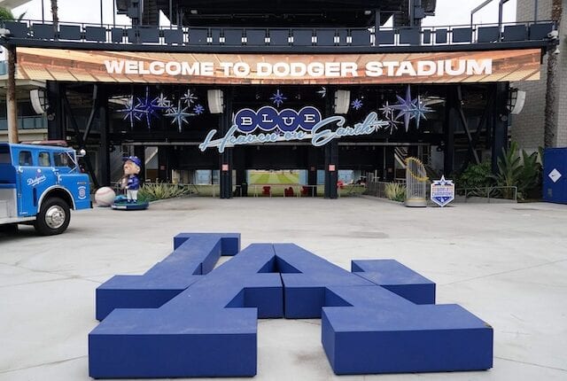 Tommy Lasorda bobblehead, 2020 World Series trophy, Dodger Stadium center field plaza, LA logo