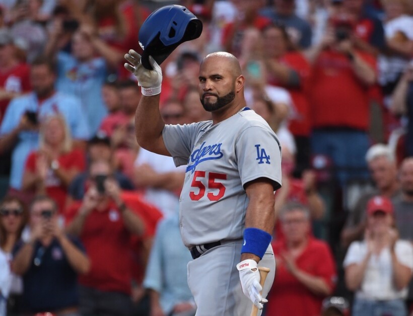 Watch: Albert Pujols hooks up Dodgers fan with his bat during game