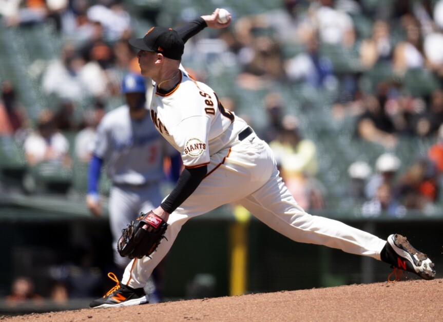 Anthony DeSclafani of the San Francisco Giants is taken out of the