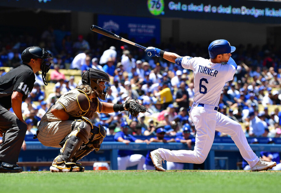 Los Angeles Dodgers shortstop Trea Turner (6) holds son Beckham Turner as  wife Kristen Turner watches during a baseball game against the San Diego  Padres, Thursday, June 30, 2022, in Los Angeles. (