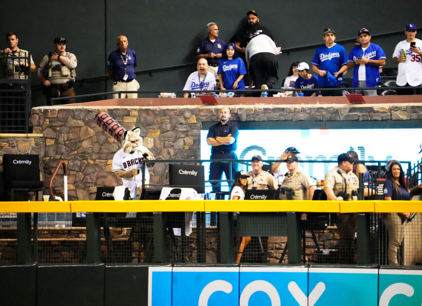 Video: TV-Visible Dodgers Fan Forced To Wear Diamondbacks Attire At Chase  Field - CBS Los Angeles