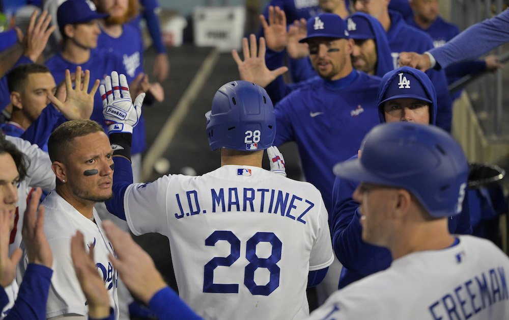 Dodgers move J.D. Martinez to injured list, recall Michael Busch